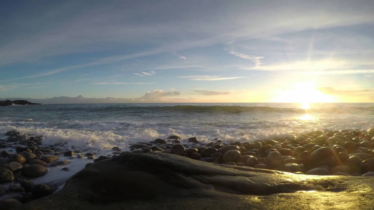 Beautiful sunset at North Sea Mølen Norway (rocky beach)